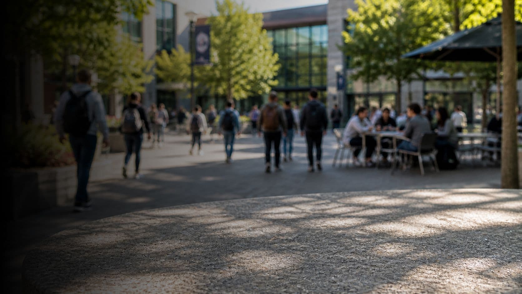 Students walking through a campus courtyard